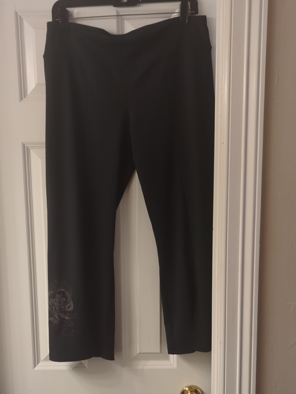 Champion Black Cropped Athletic Pants with Flared Split Hem And Floral Detail